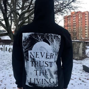 Never Trust The Living Zip Up Hoodie