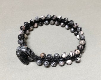 Braided leather bracelet with jasper beads