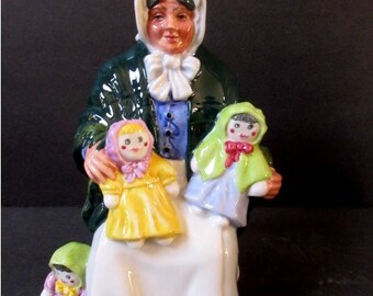 Royal Doulton Rag Doll Seller   HN 2944  7" tall   Mint Condition, no chips, scratches, repairs or crazing.