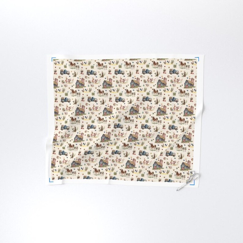 May include: A cream-colored fabric with a repeating pattern of watercolor illustrations. The design features barns, tractors, cows, chickens, and cacti. The overall theme is a rustic farm or countryside scene.