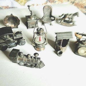 Vintage Nine Piece Durham Industries Diecast Metal Miniatures, Two are Pencil Sharpeners, Great for kids to play with.