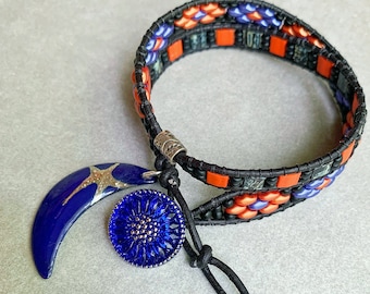 Leather Wrap Bracelet has two hand designed & woven sections of midnight color for a Cobalt Blue Czech Daisy Button and Crescent Moon Charm