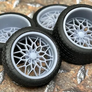 3D printed 20/21 scale-inch “Budnik Matrix” model car wheels on wide rear street tires. 1/24 or 1/25 scale.