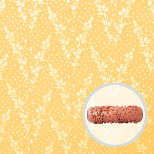 May include: A brown paint roller with a floral design. The roller is 9 inches long and has a 4-inch diameter. The roller is designed to create a textured, floral pattern on walls.