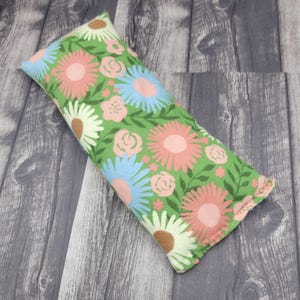 Heat pad - cold pack.  Soft flannel with pastel flowers.  3 sizes - filled with rice and flax - lavender can be added!