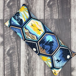 Microwave heating pad in 3 sizes that doubles as cold pack.  Beautiful mountain theme for outdoor lovers!