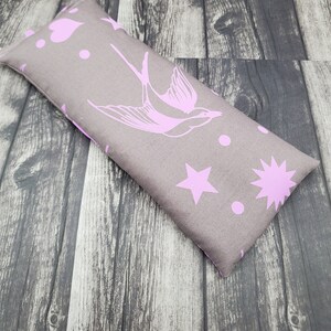 Rice heating pad made from soft cotton and filled with rice and flaxseed