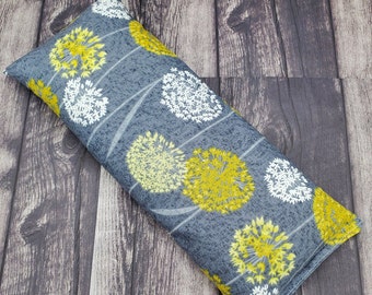 Microwave heat pad and cold pack for the dandelion lover.  Filled with rice and flax - lavender can be added!
