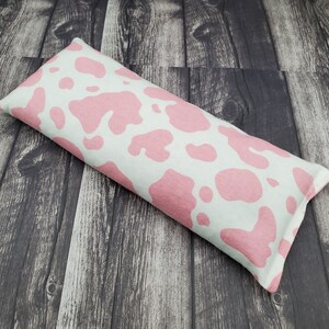 Handmade rice and flax heat pad that can be used as a cold pack.  Soft flannel that soothes tired muscles. Great gift!