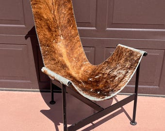 Vintage cowhide sling Chair, heavy metal, leather, Lounge, Stylish interior design, artful decor, SHIPPING NOT INCL