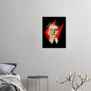 May include: A black and white portrait of a man with a red and white geometric design behind him. The man is wearing a dark suit and tie.