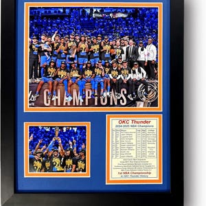May include: Framed print featuring the OKC Thunder 2024-2025 NBA Champions. The print includes a large team photo, a smaller action shot, and a roster list. The frame is black, with a blue and orange matting.