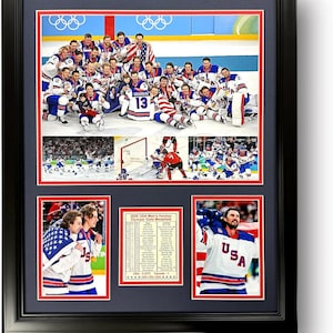 May include: Framed print featuring the 2002 USA Men's Hockey Olympic Gold Medalists. The print includes a team photo, action shots, and a list of the team members. The team is wearing red, white, and blue jerseys.