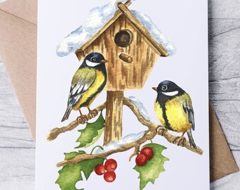 May include: Watercolor illustration of two yellow and black birds perched on a branch with a birdhouse. The branch has green holly leaves and red berries. The birdhouse is brown with snow on the roof. The image is on a white card.