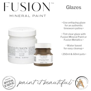 May include: Two bottles of Fusion Mineral Paint glazes. The larger bottle is 250 ml and contains clear glaze. The smaller bottle is 60 ml and contains antiquing glaze. Both bottles have a white label with black text. The text on the larger bottle reads "Fusion Mineral Paint accent it beautiful Clear Glaze". The text on the smaller bottle reads "Fusion Mineral Paint Antiquing Glaze".