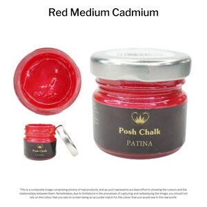 May include: A small jar of red medium cadmium paint by Posh Chalk Patina. The jar has a silver lid and a black label with the brand name and product name.
