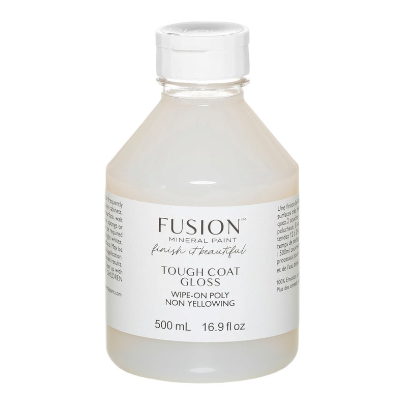 May include: A clear plastic bottle of Fusion Mineral Paint Tough Coat Gloss. The bottle is labeled with the brand name, product name, and size: 16.9 fl oz (500 ml).