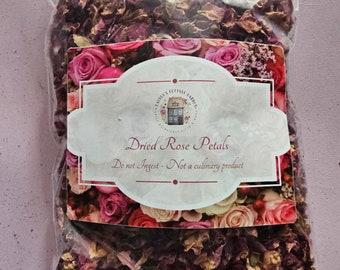 May include: A clear plastic bag filled with dried rose petals. The bag has a label that reads "Dried Rose Petals" and "Do not Ingest - Not a culinary product".