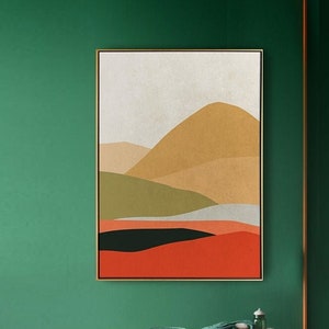 Pu&ograve; includere: Dipinto astratto di paesaggio con cornice dorata. Il dipinto presenta una catena montuosa stilizzata con sfumature di verde, arancione, rosso e nero.