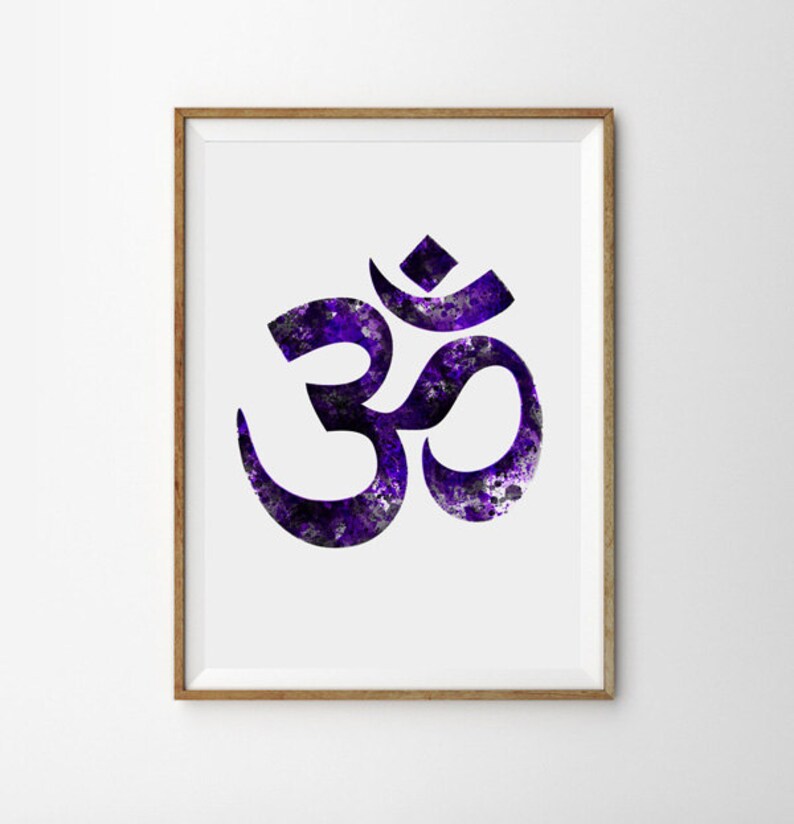May include: A framed print of the Om symbol in black with a purple watercolor background.
