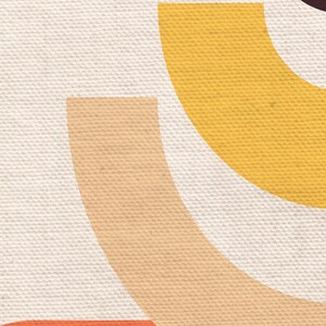 May include: Abstract geometric art print with overlapping semi-circles in shades of yellow, orange, and brown on a white canvas background.