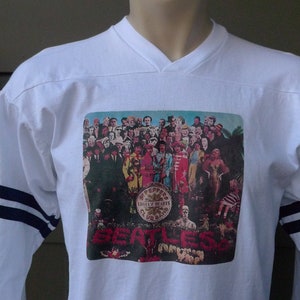 Size M (42) ** 1970s-80s Beatles Sgt Pepper Lonely Hearts Jersey Shirt  (Single Stitched) (Unworn) Licensed by Roach (C) 1976