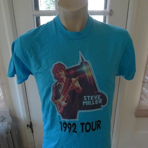 Taille M (42) ** Chemise de bande Steve Miller 1992 (simple face) (couture simple) (C) sous licence Roach 1990