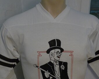 Size S (38) ** Dated 1973 Elton John Jersey Shirt  (Single Stitched) (Unworn) Licensed by Roach (C) 1973