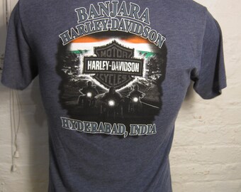 Distressed by hand done process to upcycle this one of a kind original. Womens size 1X Harley Davidson shirt