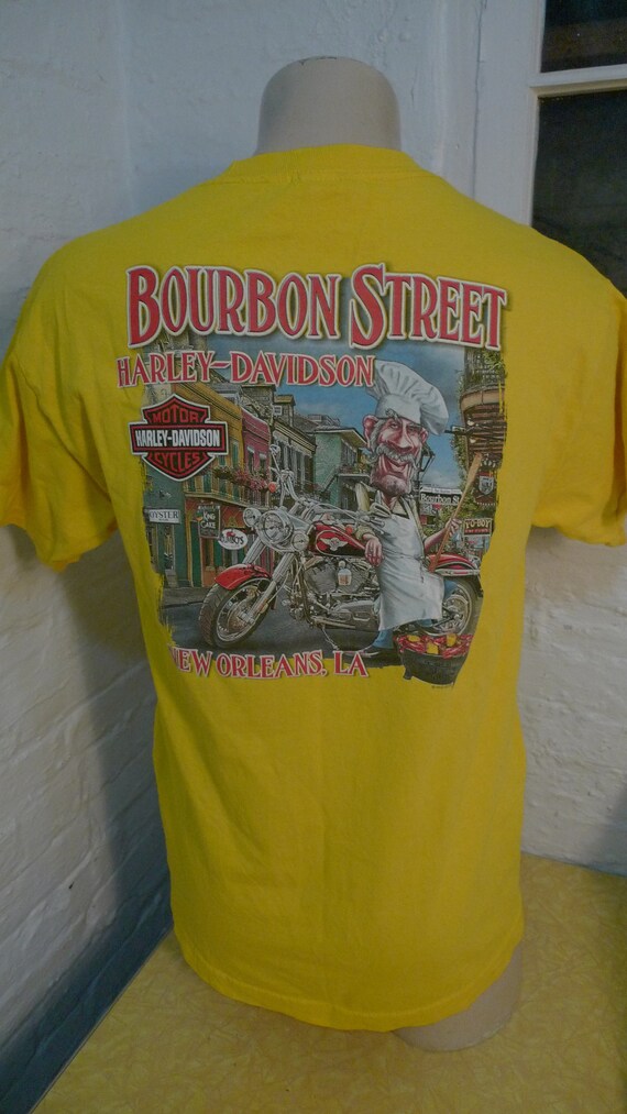 Distressed by hand done process to upcycle this one of a kind original. Womens size 1X Harley Davidson shirt