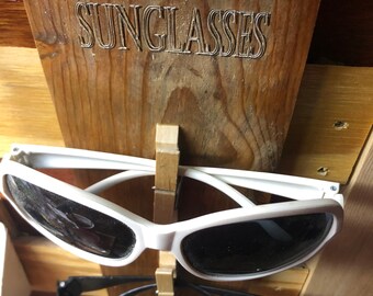 Sunglasses display, reclaimed cypress and laser engraved rack for sunglasses