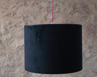 Pendant light with double-sided black velvet and floral velvet lampshade.