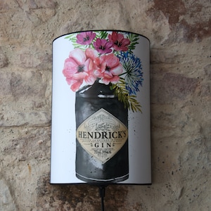 &quot;Hendricks Flowers&quot; half-cylindrical wall light, original Mercedes Charro poster.