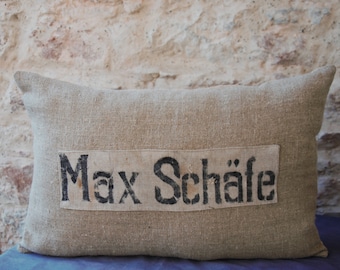 Decorative cushion in linen, hemp and German grain sack scrap.
