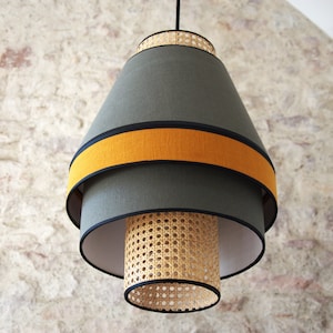 "Ubud" triple lampshade suspension in cane and washed linen.
