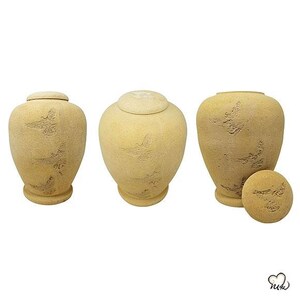 May include: Three beige ceramic urns with a textured surface and a subtle pattern. The urns have lids and are ideal for storing ashes or other small items.