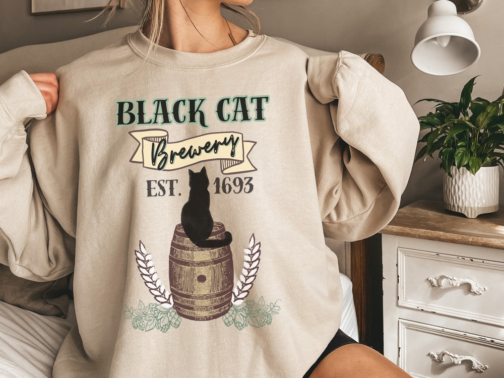 The Black Cat Brewery Sweatshirt, Halloween Sweatshirt, Fall Sweatshirt, Salem Sweatshirts, Cozy Fall Sweatshirt, Nostalgic Sweatshirt Designed By Shirttrendz