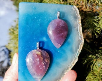 For Valentines Day partners pendants being sold as a set. Hand crafted cabachons from beautiful purple Calcodney.