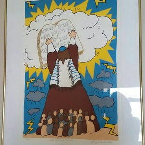 May include: A framed art print depicting a religious scene. A figure in a tallit holds up tablets against a backdrop of a blue sky with yellow lightning bolts and a white cloud. A crowd of people stands below.