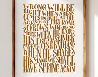 May include: A rectangular framed wall art piece featuring dark gold typography on a white background. The text reads: WRONG WILL BE RIGHT WHEN ASLAN COMES IN SIGHT, AT THE SOUND OF HIS ROAR, SORROWS WILL BE NO MORE WHEN HE BARES HIS TEETH WINTER MEETS ITS DEATH AND WHEN HE SHAKES HIS MANE, WE SHALL HAVE SPRING AGAIN.