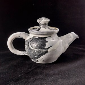 Handmade ceramic black and white teapot