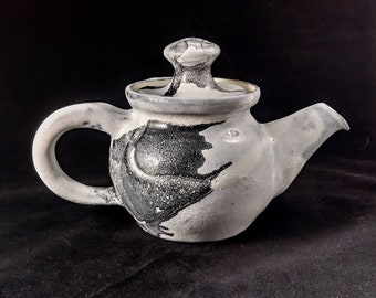 Handmade ceramic black and white teapot