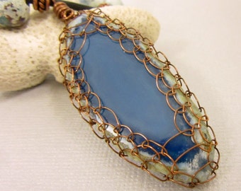 Wire Netted Blue Agate Slice Pendant, Blue Agate and Speckled Blue Bead Leather Cord Necklace and Coiled Copper Ends and Copper Toggle Clasp