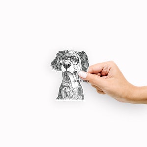 May include: Black and white illustration of a dog wearing sunglasses and sticking its tongue out. The dog is a Setter breed with a speckled coat.