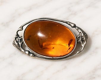Spilla vintage in argento sterling 925 con cabochon color cognac e ambra, stile Art Nouveau.