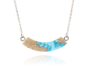 Headland necklace - inspired by the ocean and crafted from beach sand and aquamarine blue resin