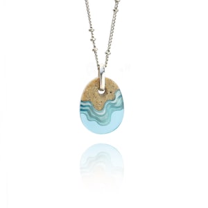 Oceanfront necklace cute ocean inspired necklace handmade from beach sand and aquamarine blue resin an a dainty chain image 1