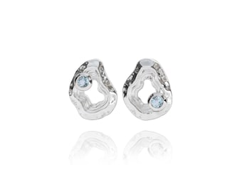 Oasis ear studs - inspired by the ocean and handcrafted from eco-friendly recycled 925 sterling silver and blue topaz gemstones