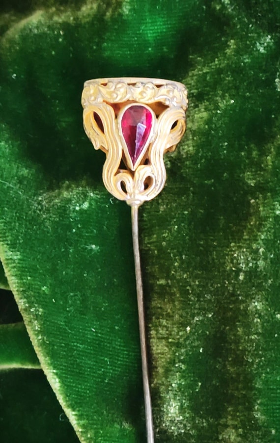 Antique Brass Hatpin Embellished with Ruby Colored