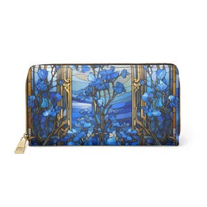 May include: A rectangular zip-around wallet featuring a stained glass pattern of blue flowers and vines against a light blue sky. The design includes vertical gold-toned architectural borders and a gold-colored metal zipper pull on the side.